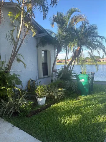 a view of a house with a garden