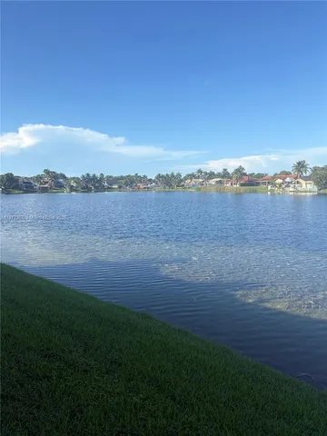 a view of lake with mountain