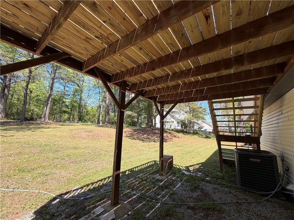 934 Bay Ridge Drive Lawrenceville, GA 30045 - Photo 18 of 78 a view of a backyard of the house