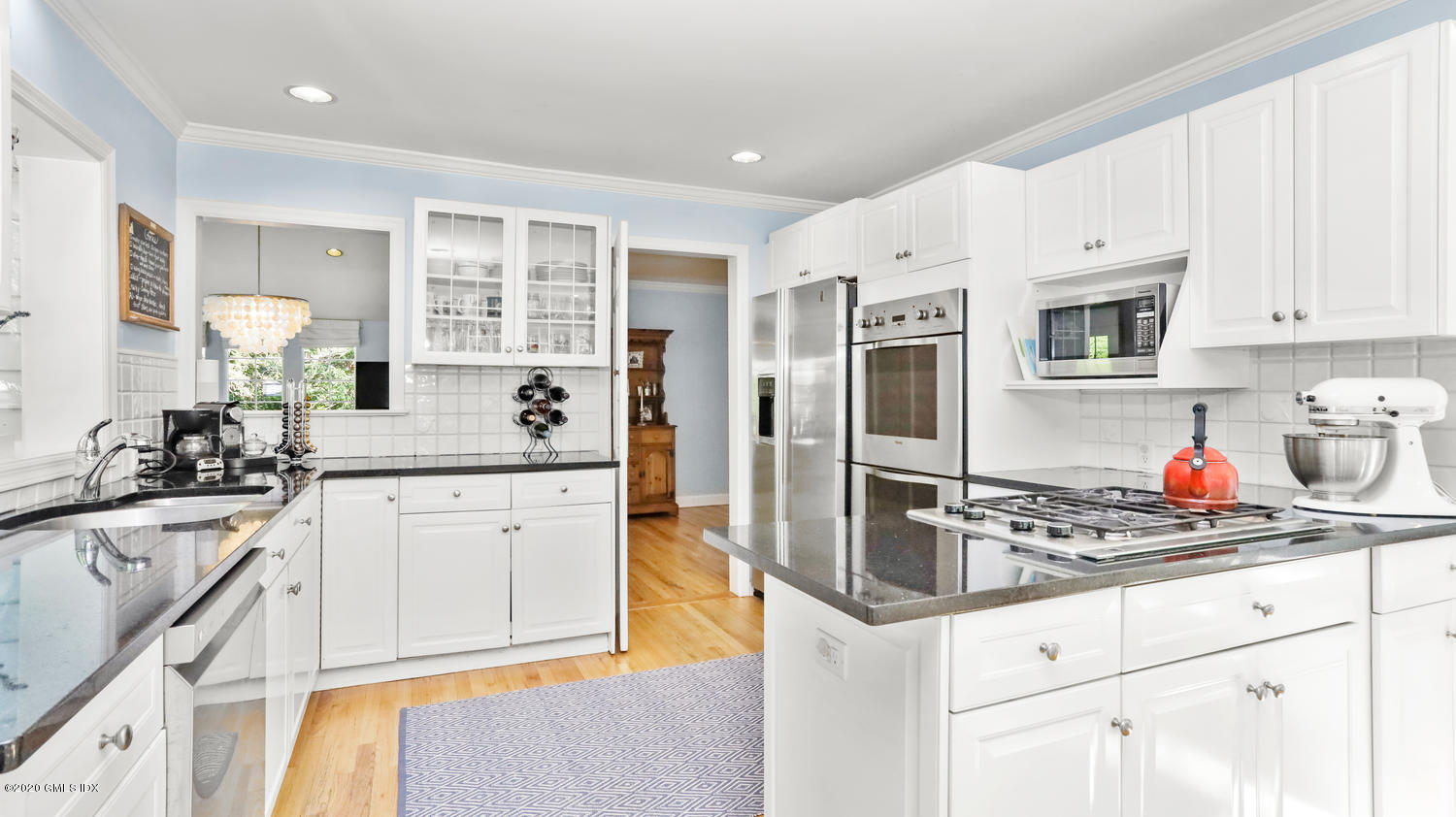 15 Linwood Avenue Riverside, CT 06878 - Photo 8 of 33 a kitchen with stainless steel appliances granite countertop a sink stove refrigerator and cabinets