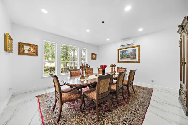a view of a dining room with furniture