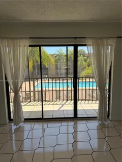 a view of a room with a large window