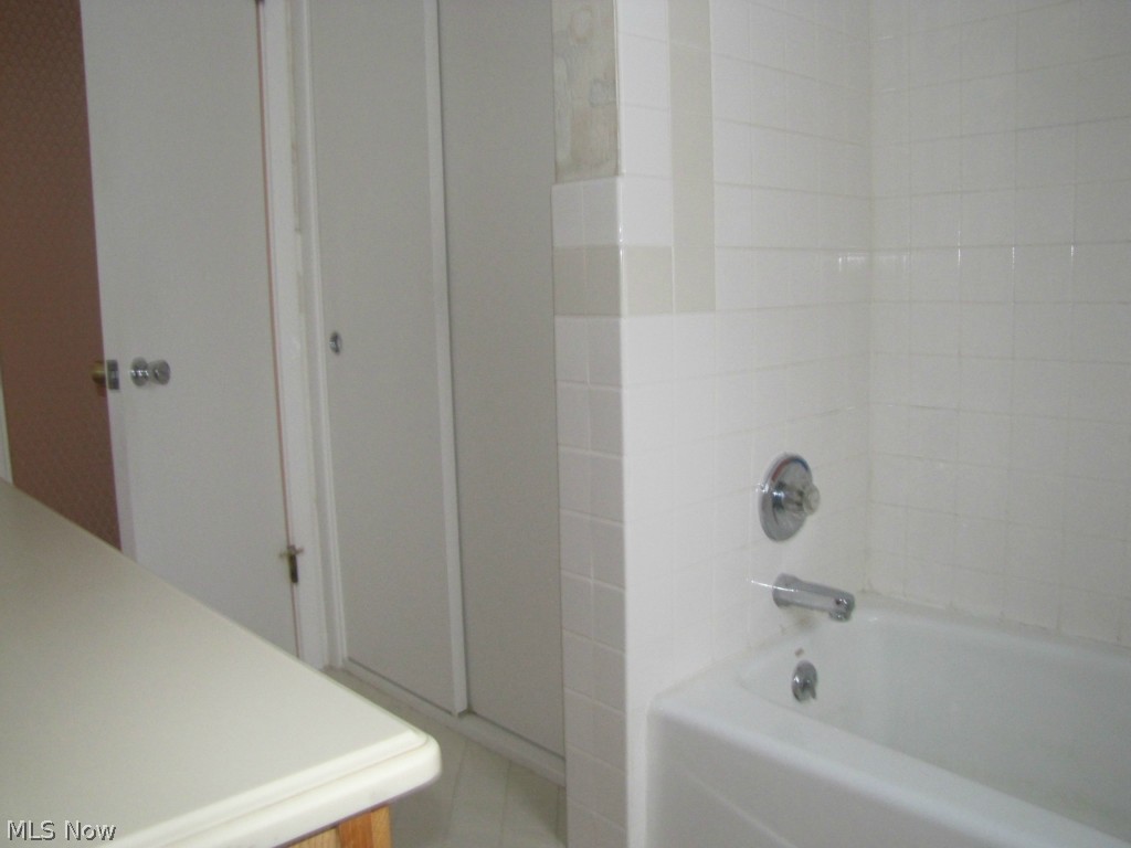 5712 Faraday Road Cleveland, OH 44124 - Photo 14 of 22 Large storage closet in bathroom. Bathtub and tile in very good condition.