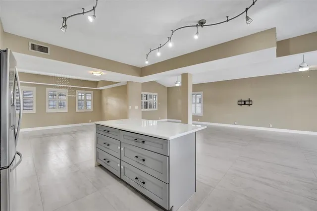 a bathroom with a sink double vanity and shower