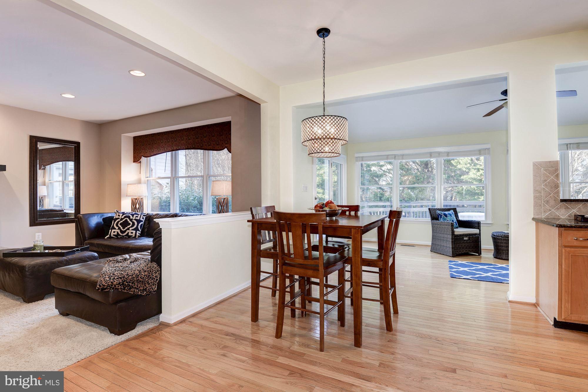 1326 Murray Downs Way Reston, VA 20194 - Photo 12 of 41 a living room with furniture and a wooden floor