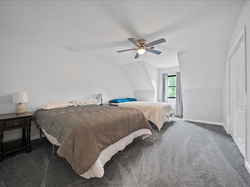 8104 Jack Bond Road Arlington, TN 38002 - Photo 21 of 40 a spacious bedroom with a bed a window and closet