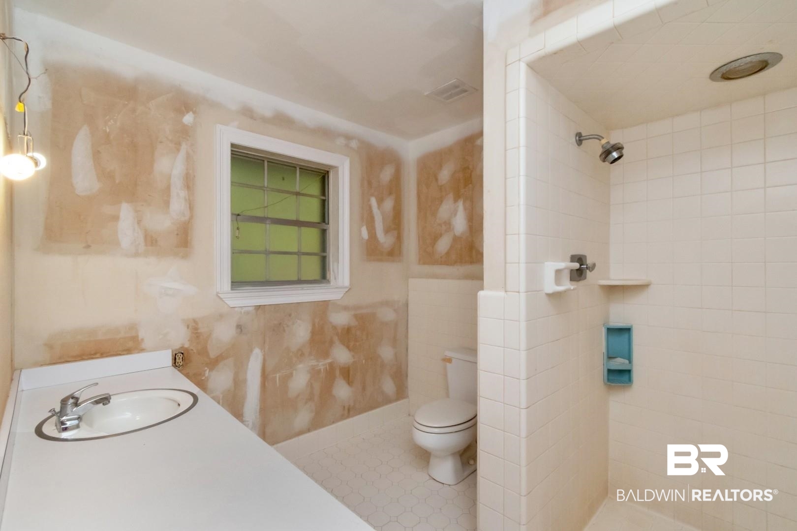 241 Suzanne Circle Mobile, AL 36608 - Photo 23 of 41 Bathroom with a tile shower and vanity