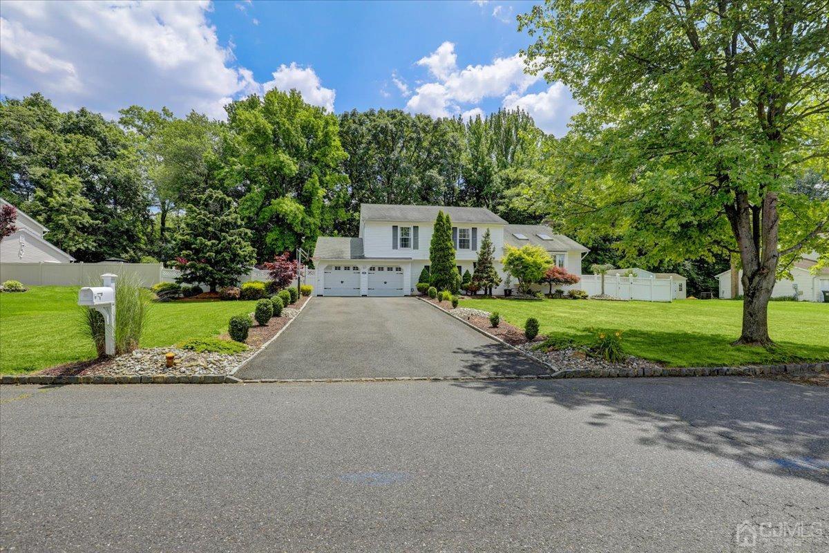 a view of a house with a street