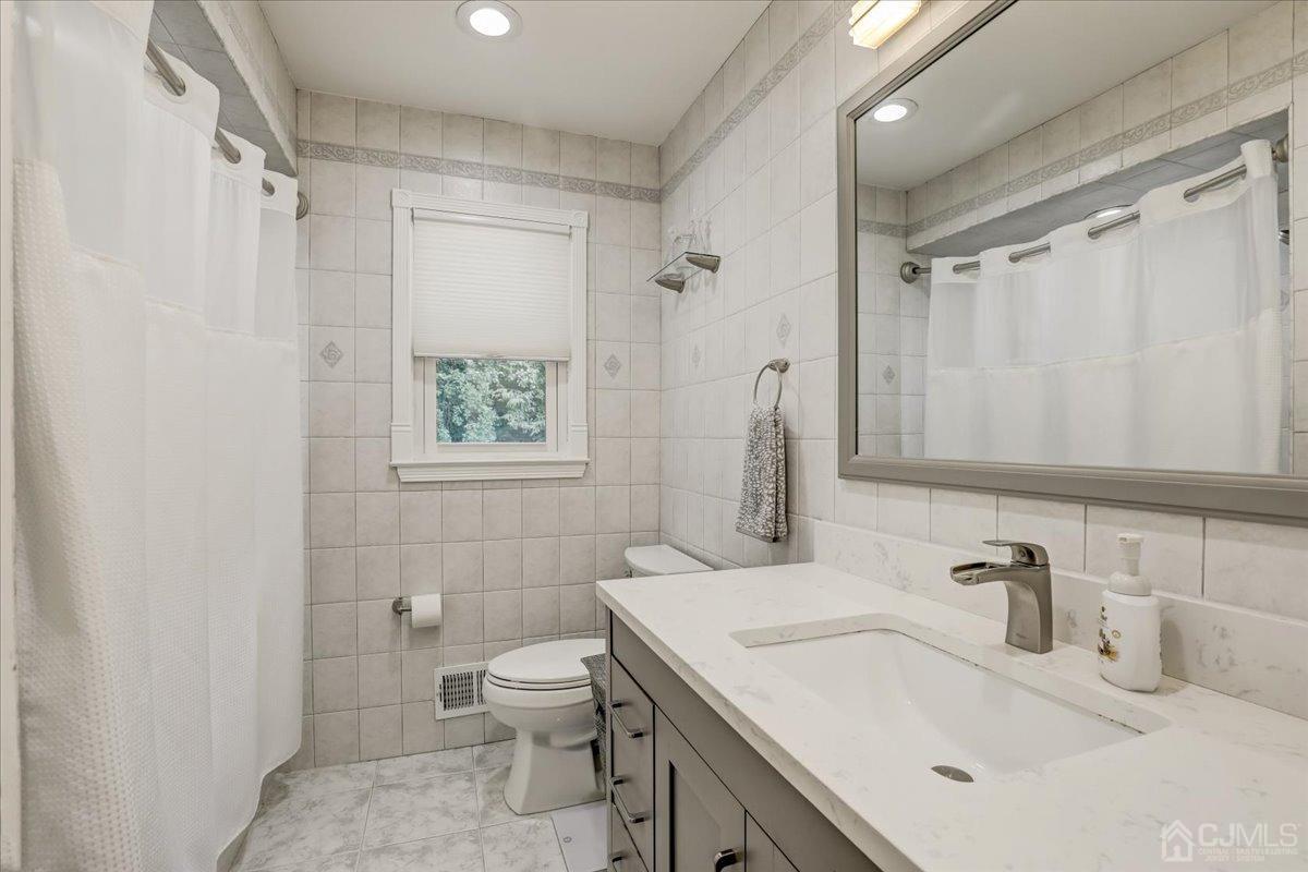 10 William Way Old Bridge, NJ 07747 - Photo 23 of 33 a bathroom with a sink toilet and shower