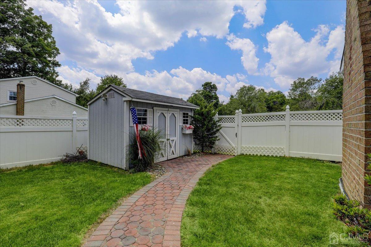 10 William Way Old Bridge, NJ 07747 - Photo 32 of 33 a view of an house with backyard space and garden