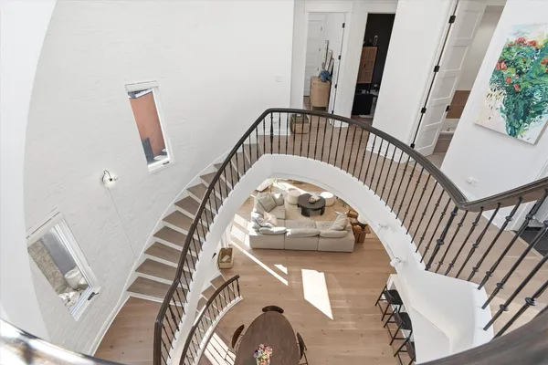 a room with gym equipment and a view of living room
