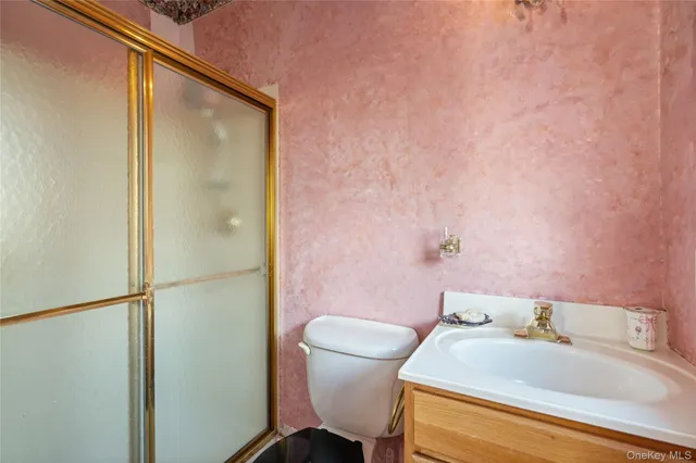 a bathroom with a sink and a toilet