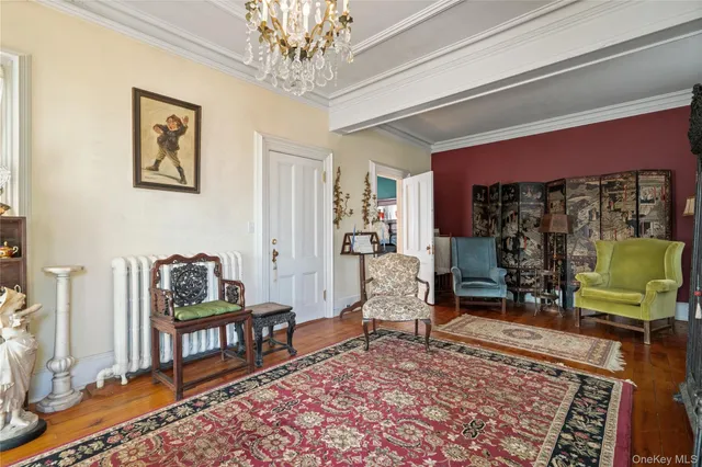 a living room with furniture and a rug