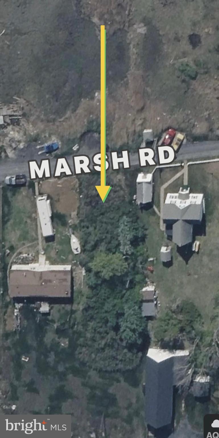 0017 Marsh Road Ewell, MD 21824 - Photo 6 of 12 a view of a house with outdoor space