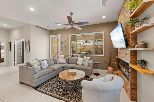 a kitchen with a dining table cabinets and appliances