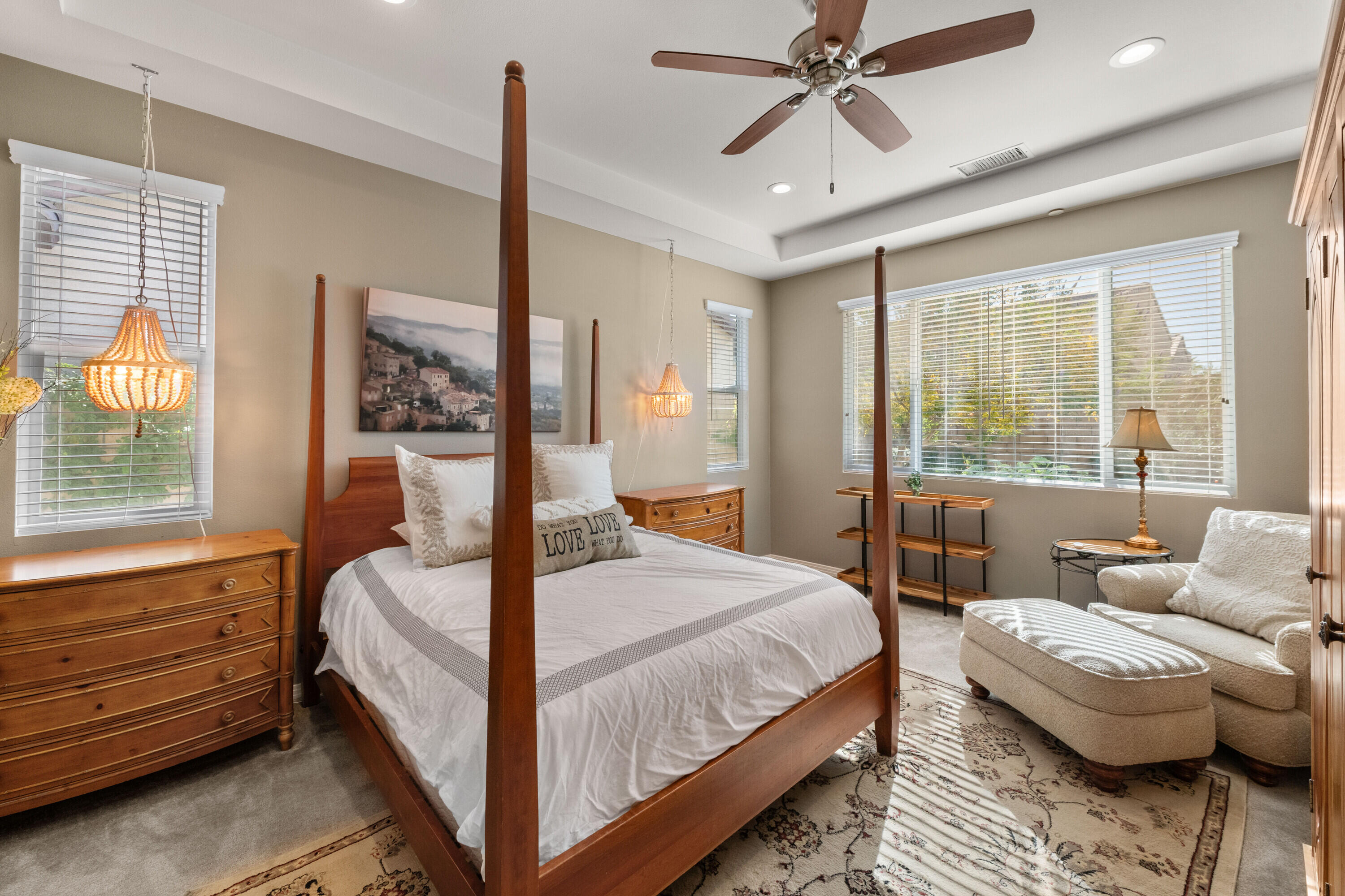 78863 Amare Way Palm Desert, CA 92211 - Photo 25 of 39 a bedroom with a bed and wooden floor