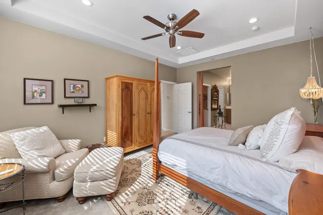 a spacious bathroom with a double vanity sink double and mirror