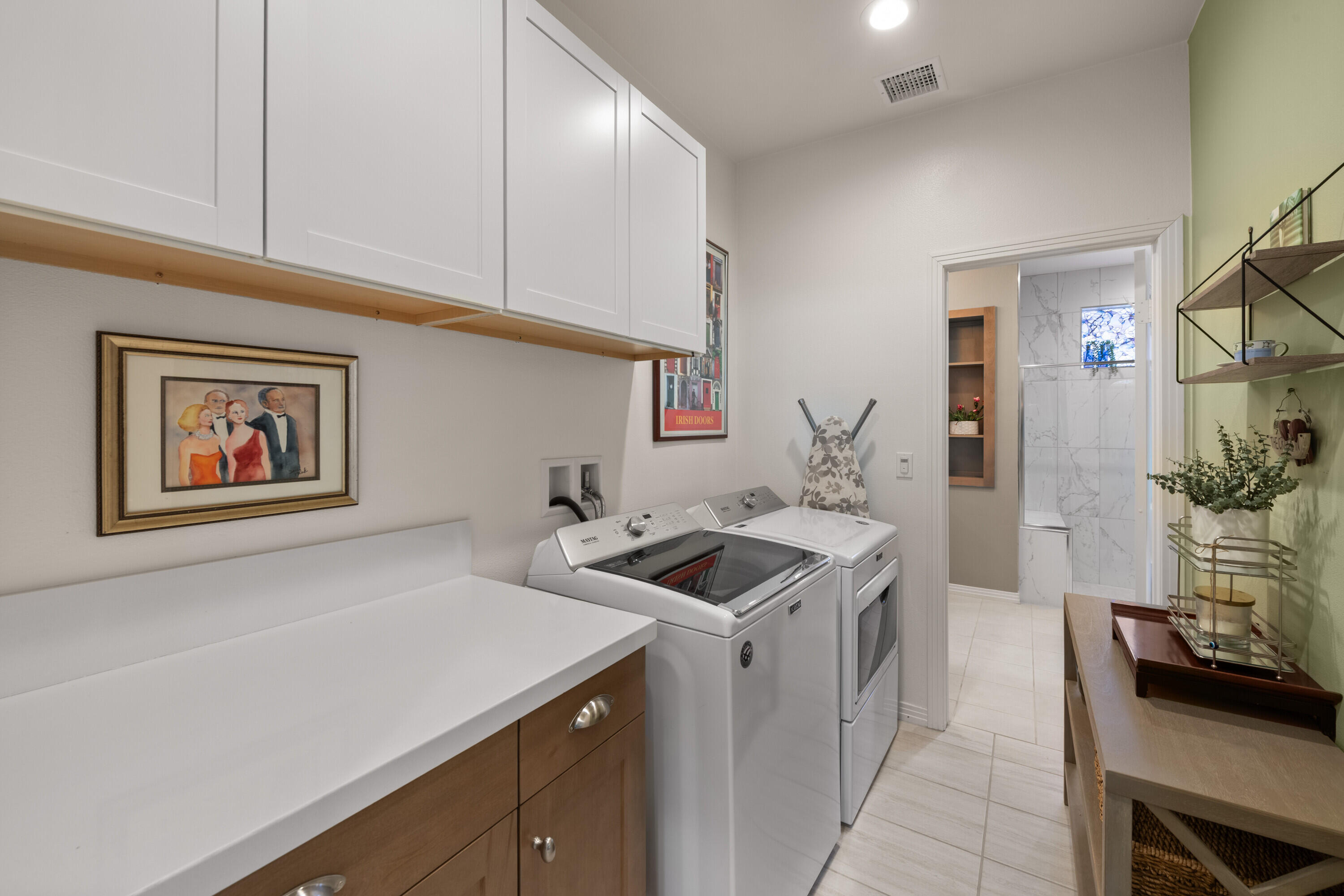 78863 Amare Way Palm Desert, CA 92211 - Photo 31 of 39 a view of a kitchen area with furniture and wooden floor