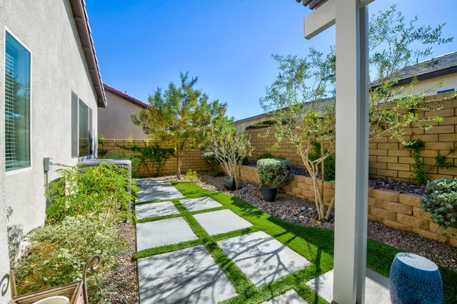 a backyard of a house with lots of green space