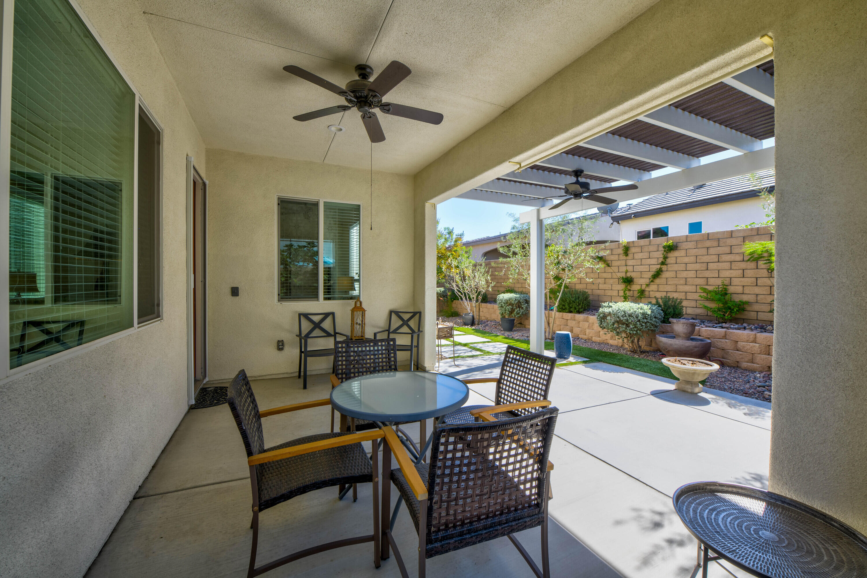 78863 Amare Way Palm Desert, CA 92211 - Photo 39 of 39 a living room with furniture and a large window
