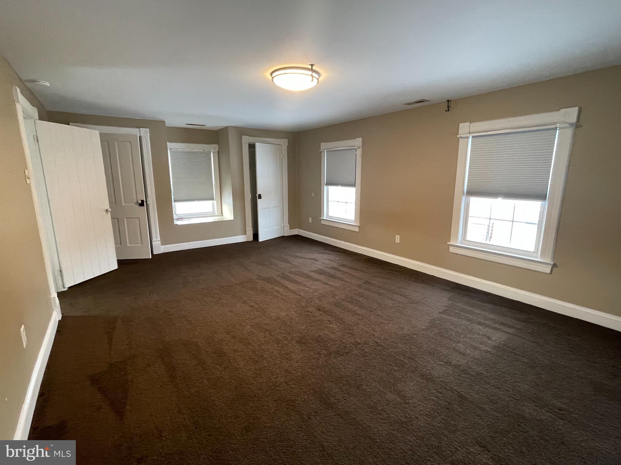 33 Crookhorn Road Montross, VA 22520 - Photo 11 of 18 an empty room with windows
