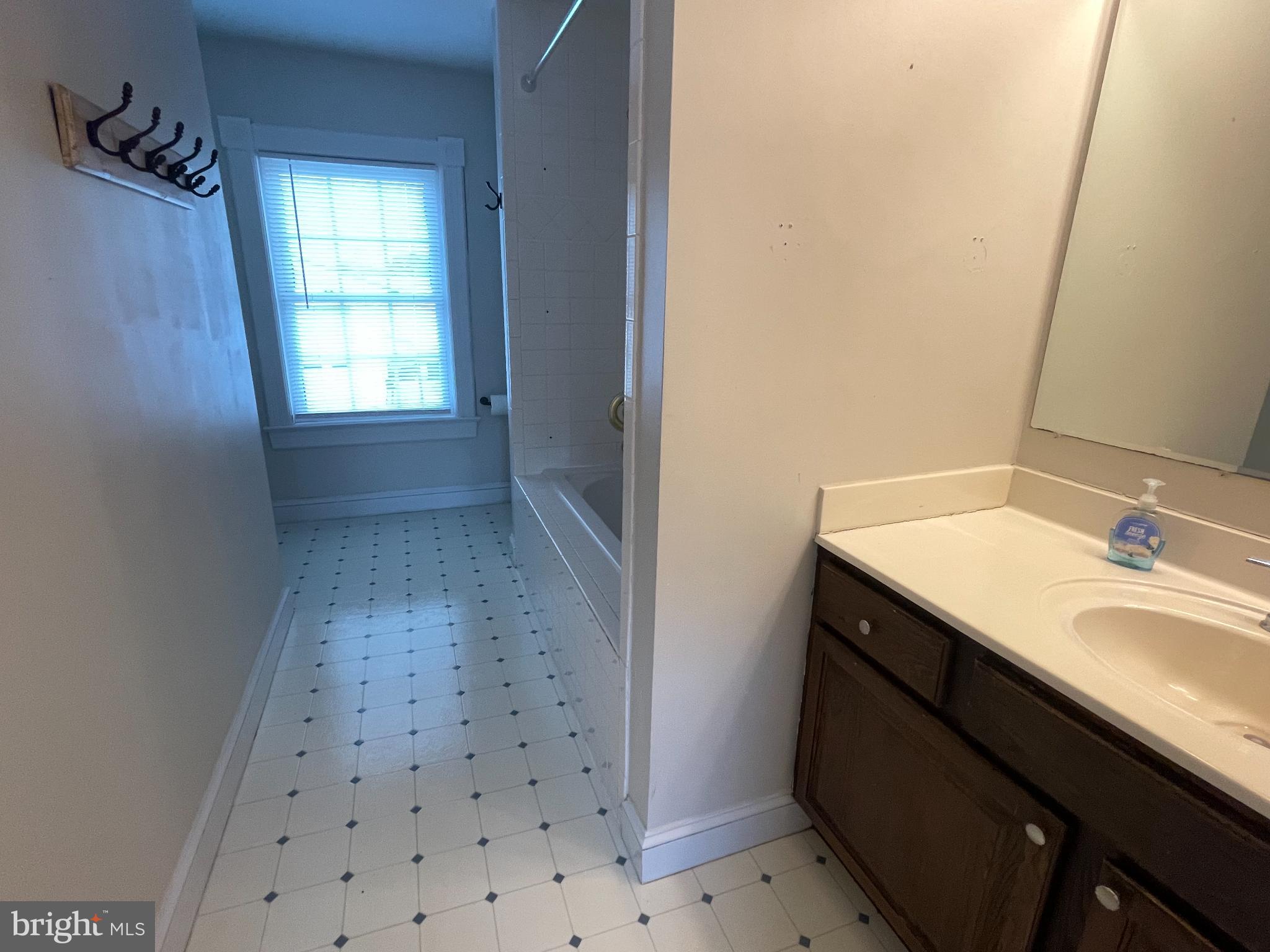 33 Crookhorn Road Montross, VA 22520 - Photo 12 of 18 a bathroom with a sink a vanity and a mirror
