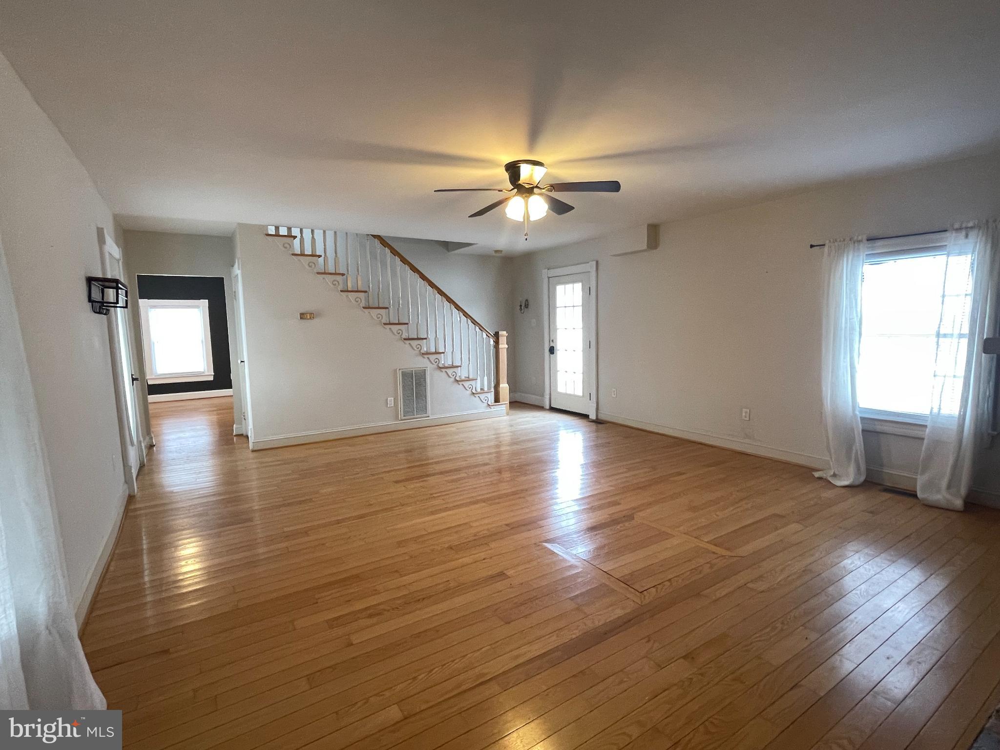 33 Crookhorn Road Montross, VA 22520 - Photo 14 of 18 wooden floor in an empty room with a window