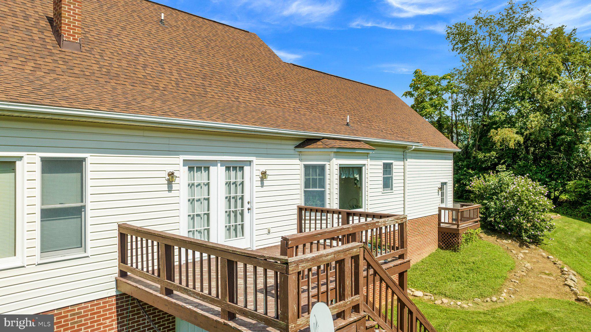 409 Stickley Loop Strasburg, VA 22657 - Photo 27 of 43 Rear deck with steps down to the backyard