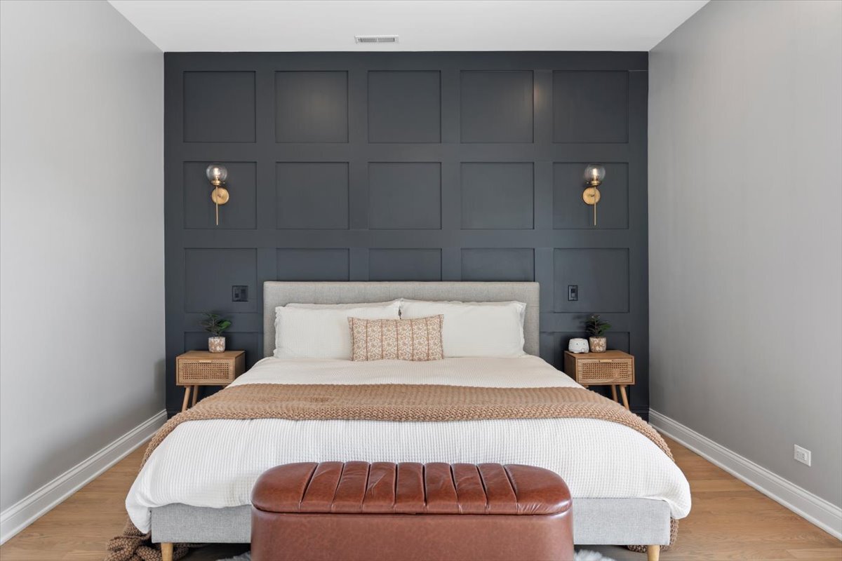 2463 West Foster Avenue, Unit 3 Chicago, IL 60625 - Photo 16 of 31 a bedroom with a bed and a window