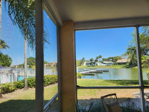 a view of a lake from a balcony