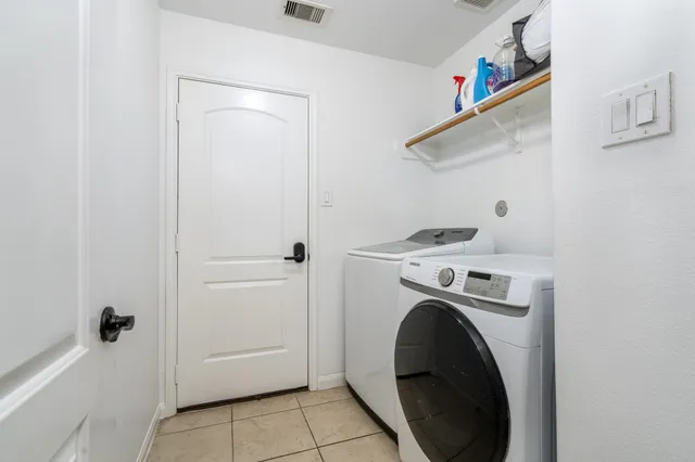 a view of house with yard