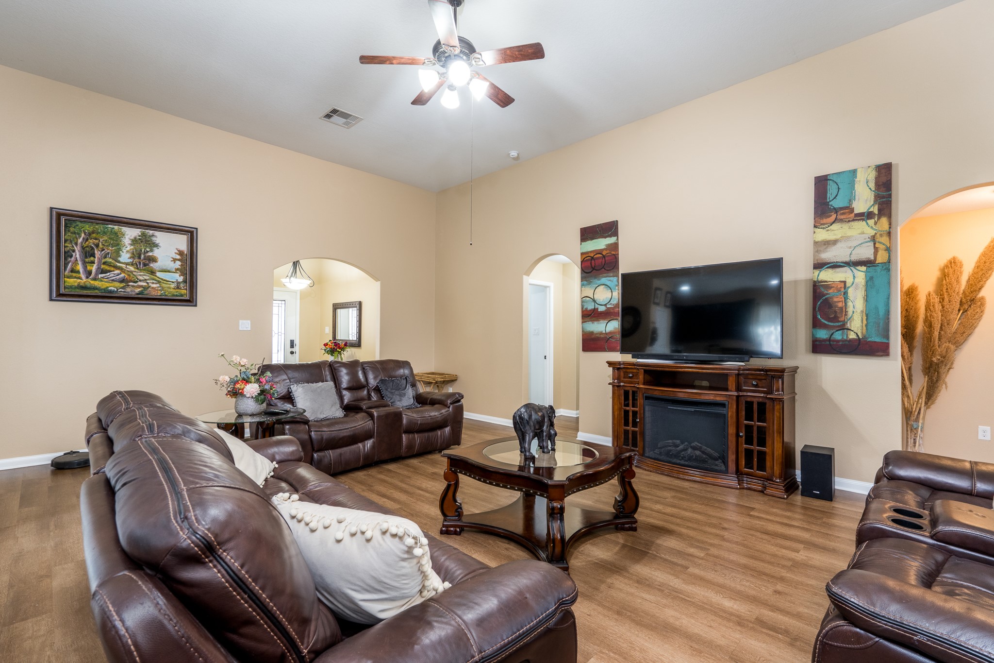 18879 Atascosa Trail Magnolia, TX 77355 - Photo 4 of 25 a living room with furniture and a flat screen tv