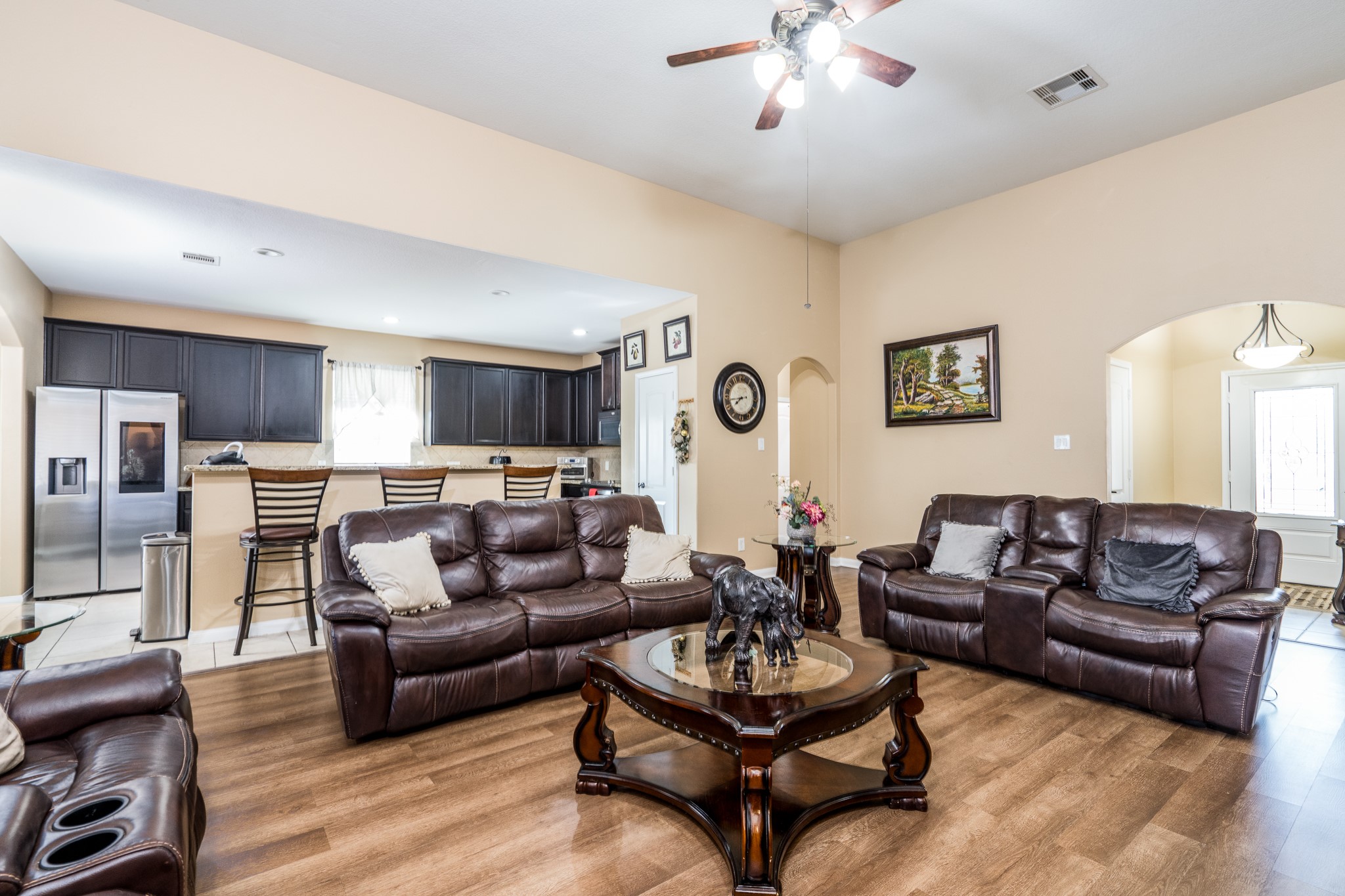 18879 Atascosa Trail Magnolia, TX 77355 - Photo 5 of 25 a living room with furniture and a wooden floor