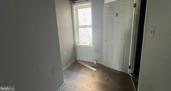 an empty room with windows