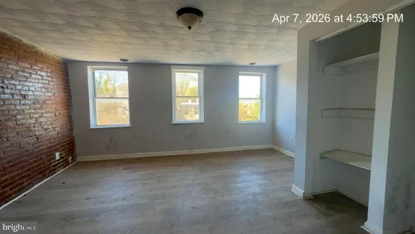 an empty room with windows