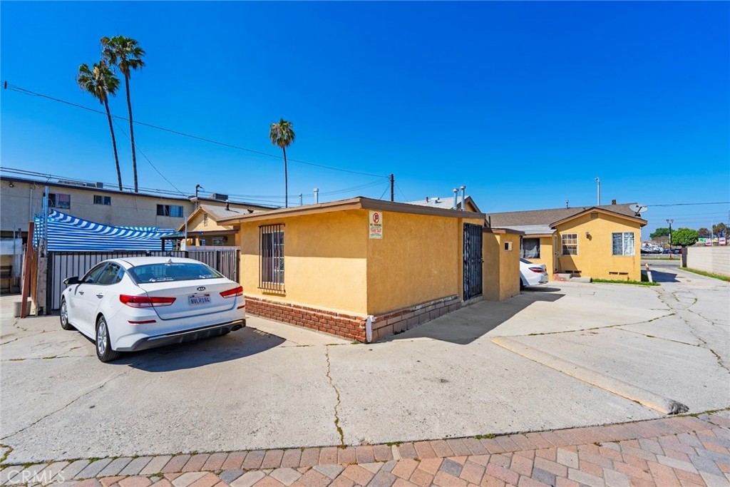 8564 Artesia Boulevard Bellflower, CA 90706 - Photo 8 of 20 a car parked on the side of the road