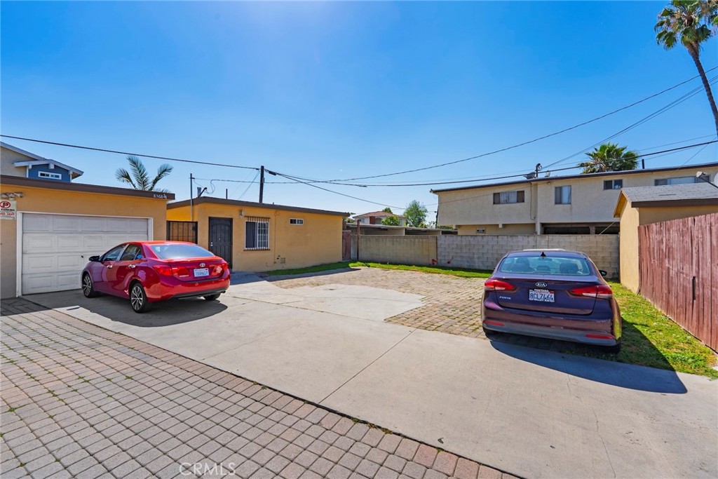 8564 Artesia Boulevard Bellflower, CA 90706 - Photo 9 of 20 a car parked in parking