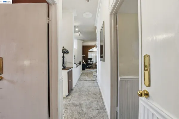 a view of hallway with livingroom