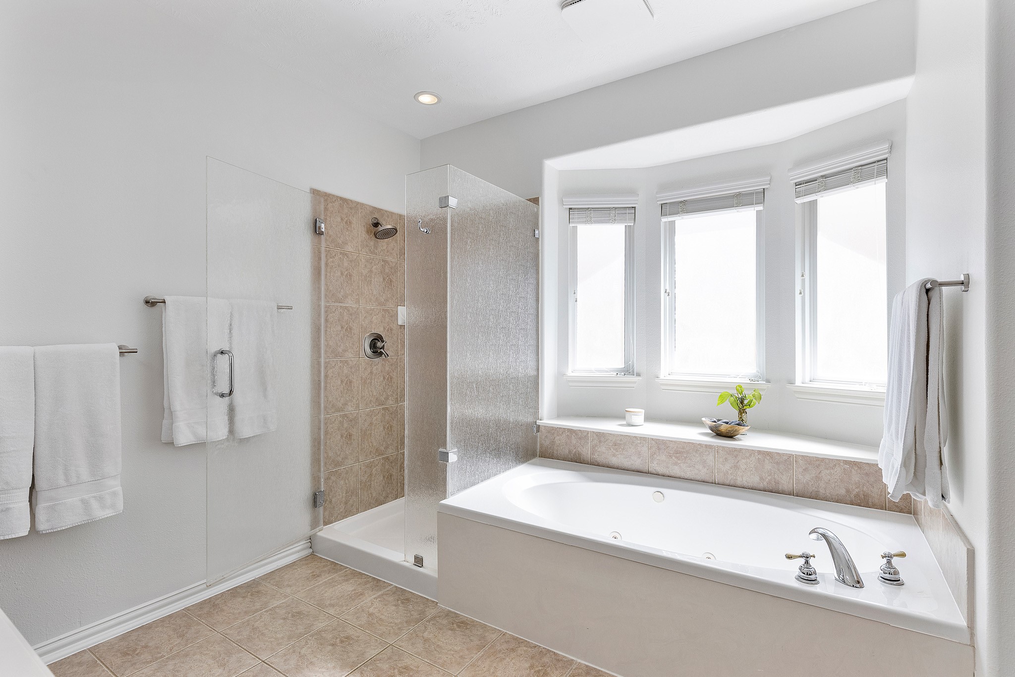 30 South Dulcet Hollow Circle Spring, TX 77382 - Photo 22 of 36 a bathroom with a granite countertop tub sink and mirror