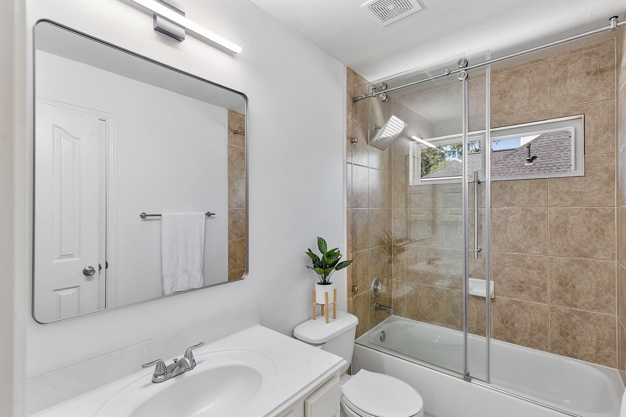 30 South Dulcet Hollow Circle Spring, TX 77382 - Photo 26 of 36 a bathroom with a sink toilet and shower