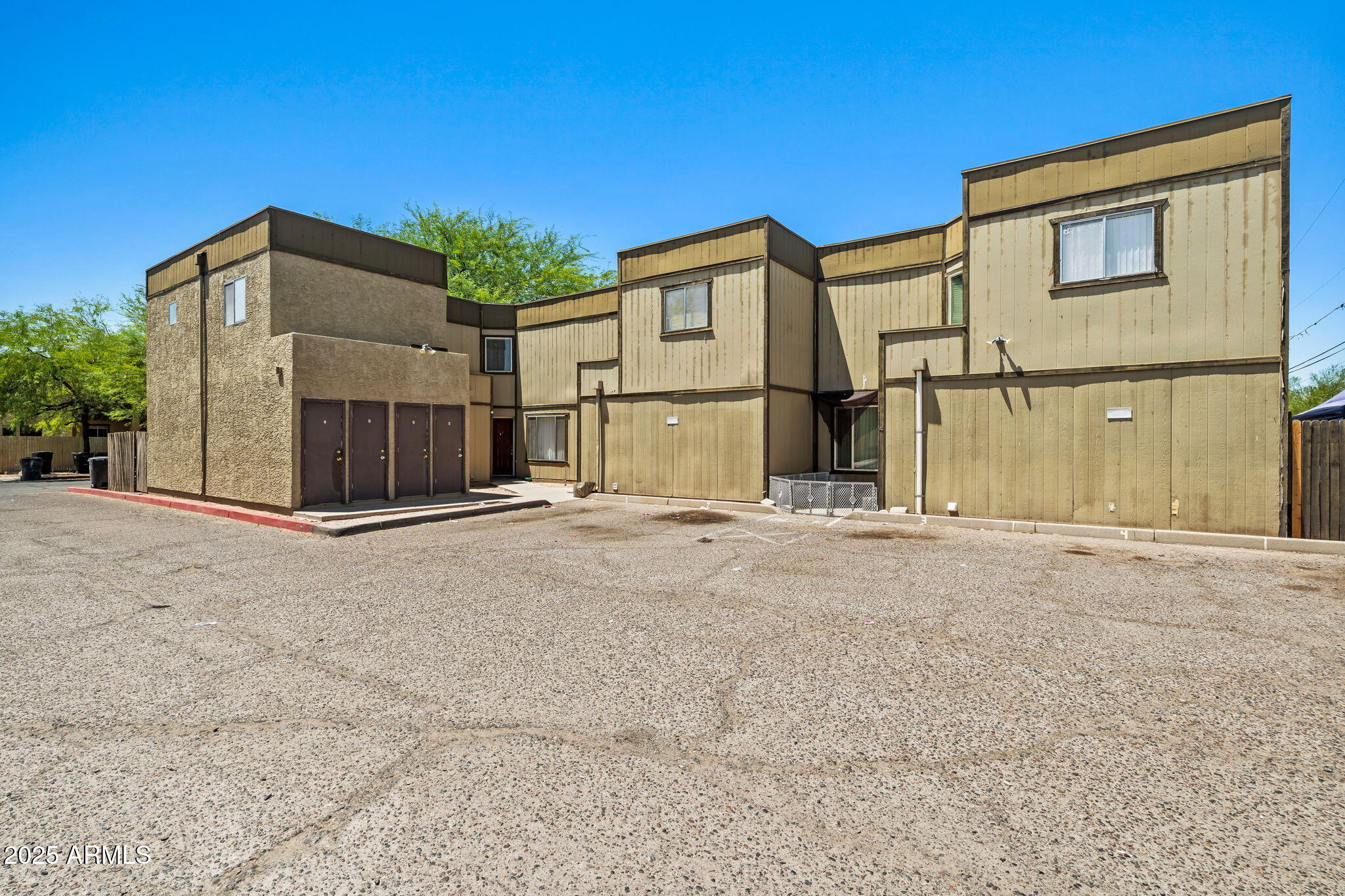 1742 East Pepper Circle, Unit 2 Mesa, AZ 85203 - Photo 1 of 26 a view of a house with a fence