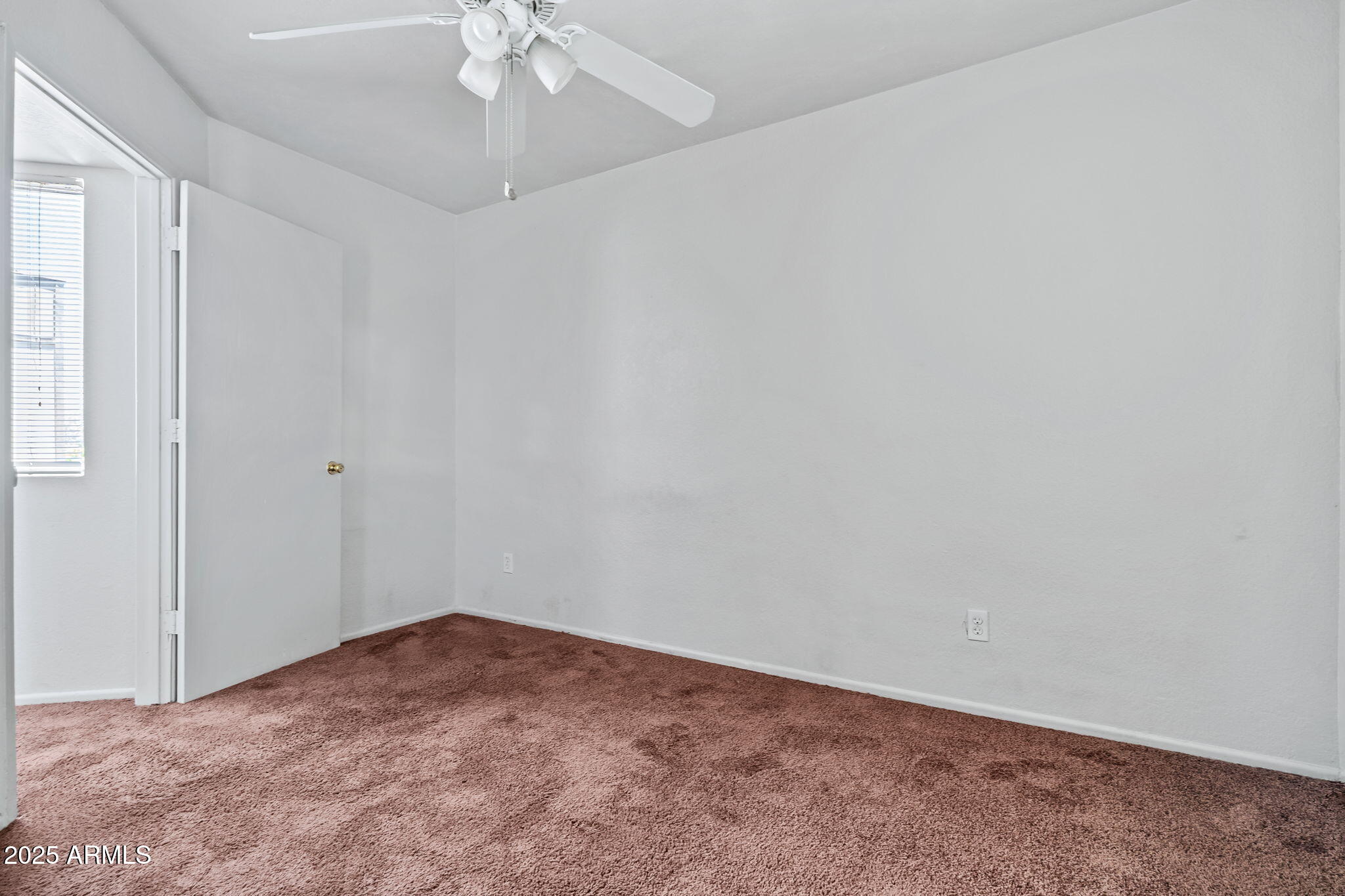 1742 East Pepper Circle, Unit 2 Mesa, AZ 85203 - Photo 21 of 26 a view of an empty room