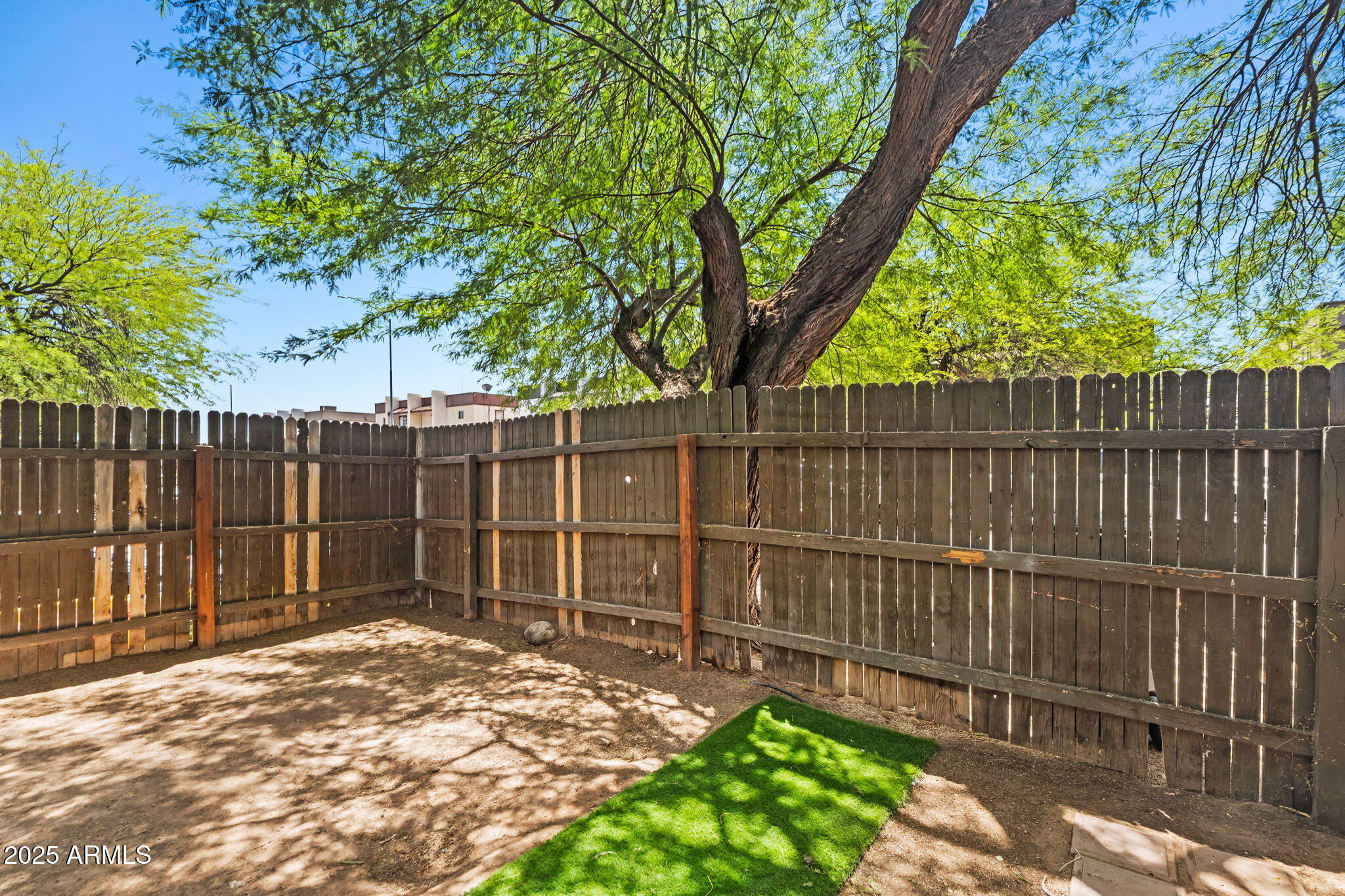 1742 East Pepper Circle, Unit 2 Mesa, AZ 85203 - Photo 26 of 26 a view of a backyard