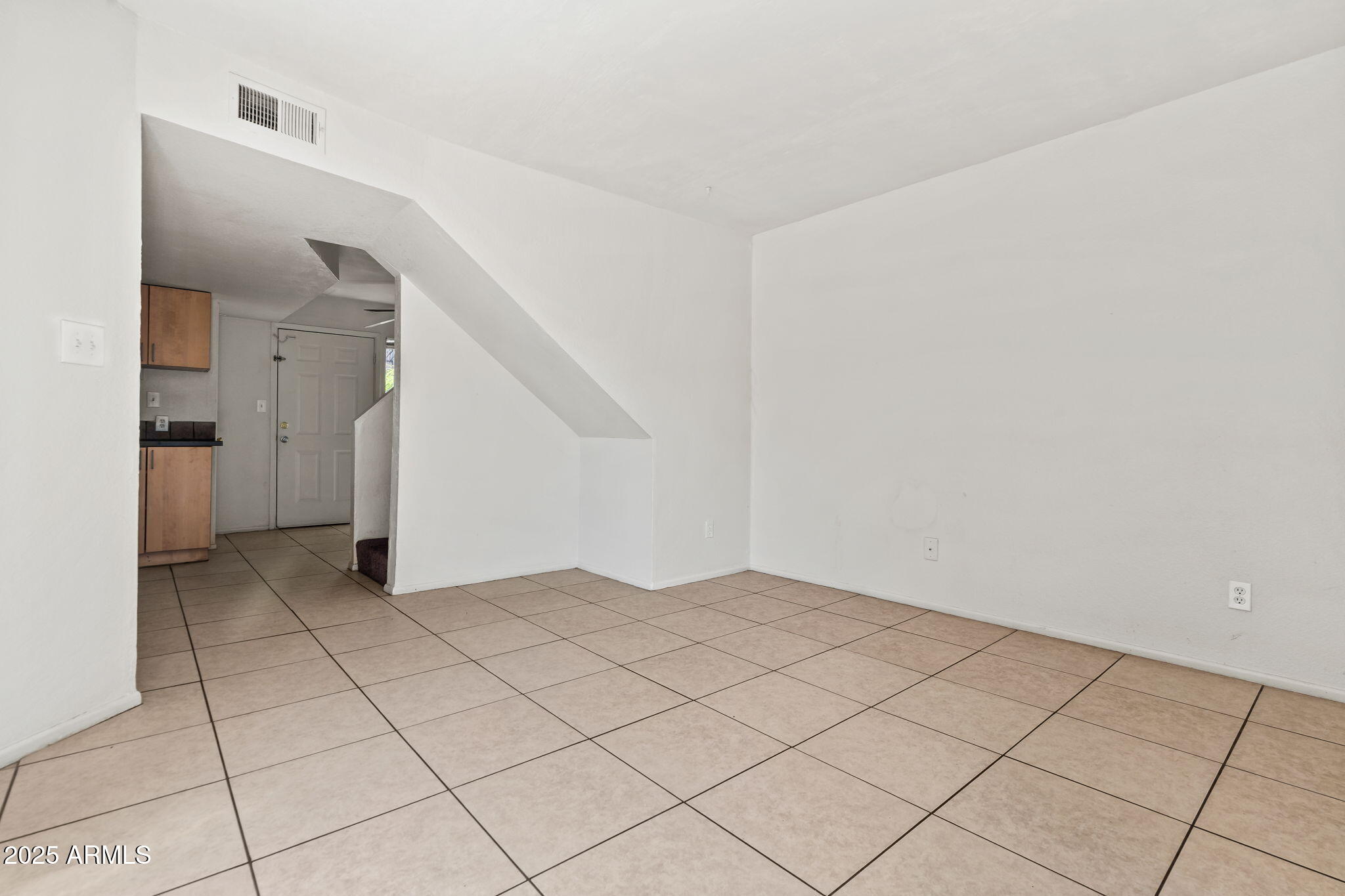 1742 East Pepper Circle, Unit 2 Mesa, AZ 85203 - Photo 3 of 26 a view of an empty room