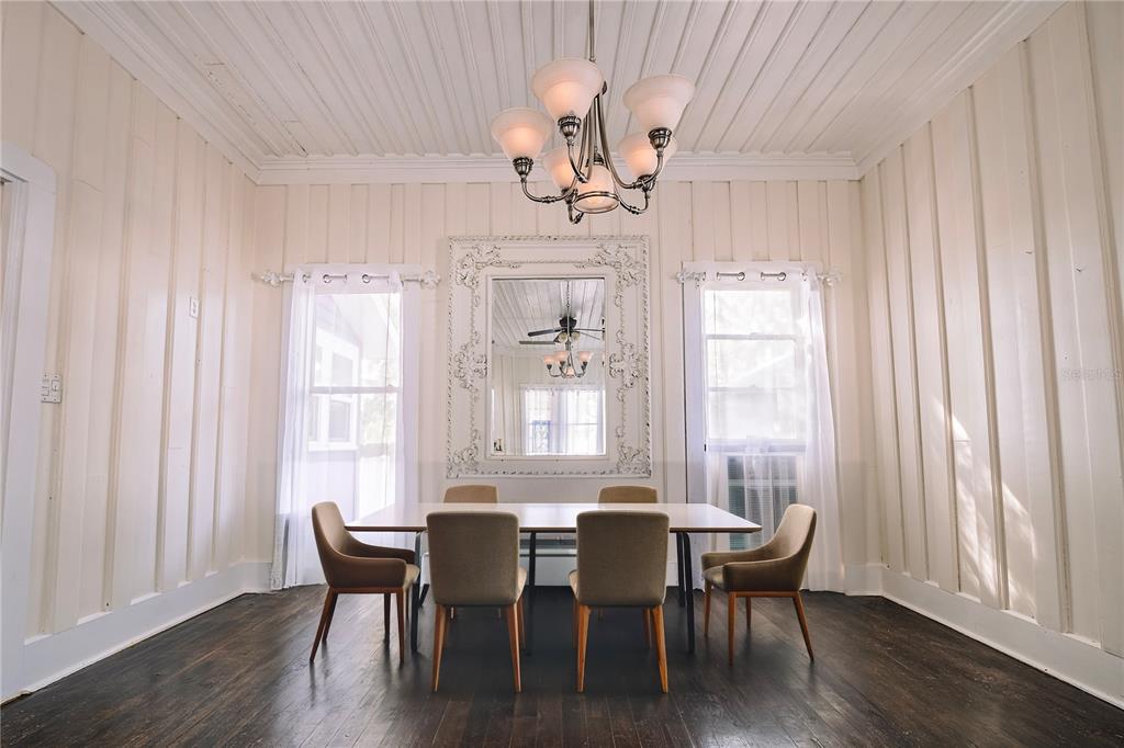 510 East Key Avenue Eustis, FL 32726 - Photo 13 of 40 a view of a dining room with furniture windows and wooden floor
