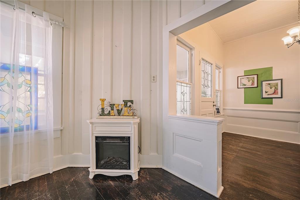 510 East Key Avenue Eustis, FL 32726 - Photo 19 of 40 a living room with furniture and a fireplace