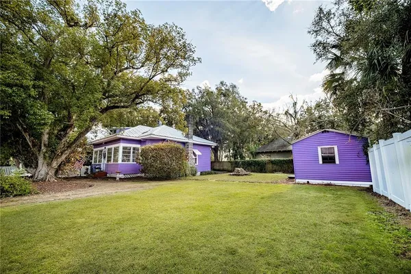 a view of pool with yard