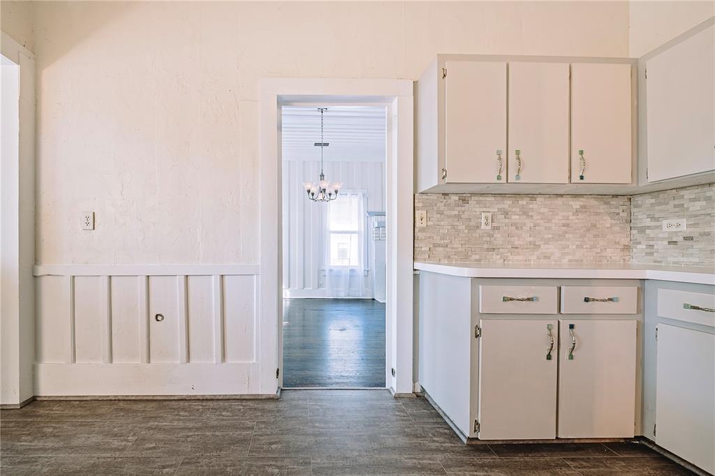 510 East Key Avenue Eustis, FL 32726 - Photo 23 of 40 a view of entryway with kitchen cabinets