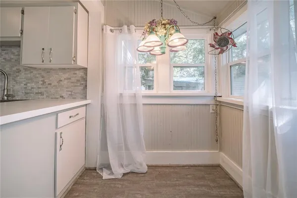 a view of entryway with chandelier