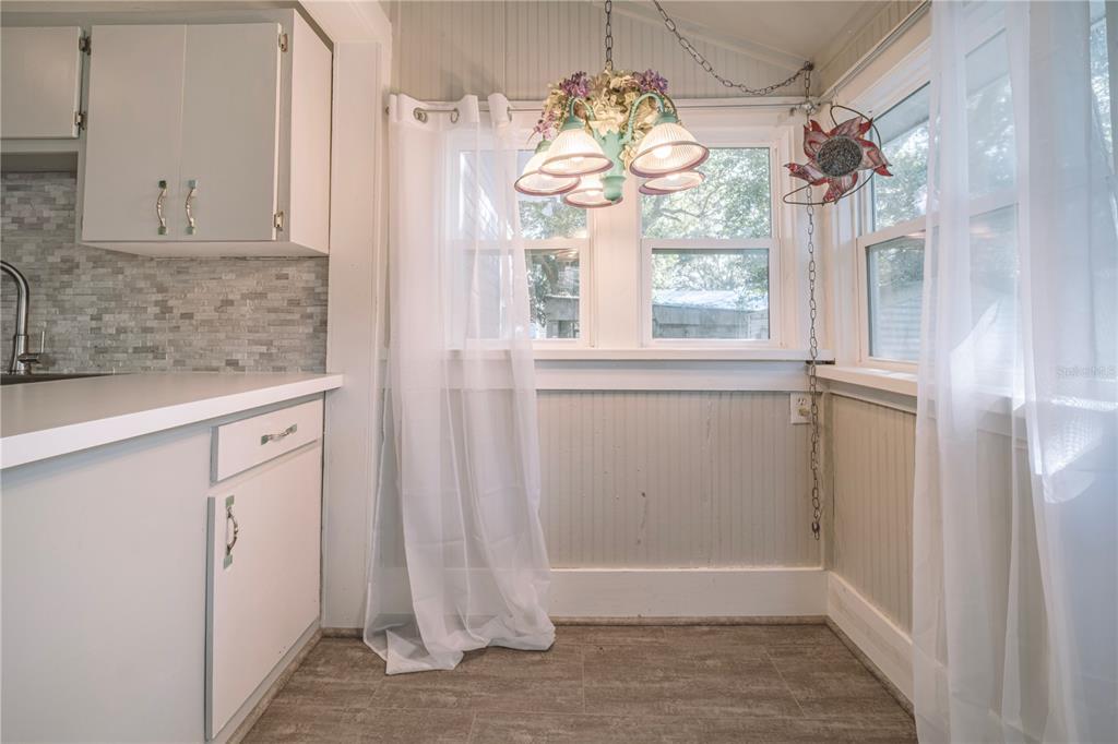 510 East Key Avenue Eustis, FL 32726 - Photo 25 of 40 a view of entryway with chandelier